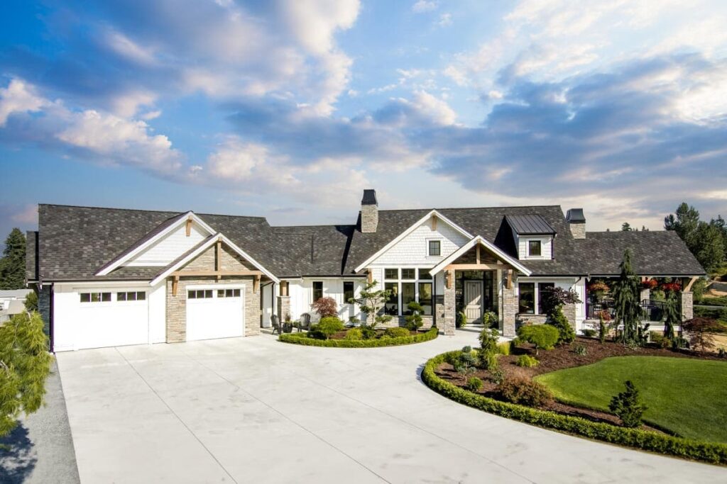 5-Bedroom 1-Story Modern Farmhouse with Angled and Lower Level Garages (Floor Plan)